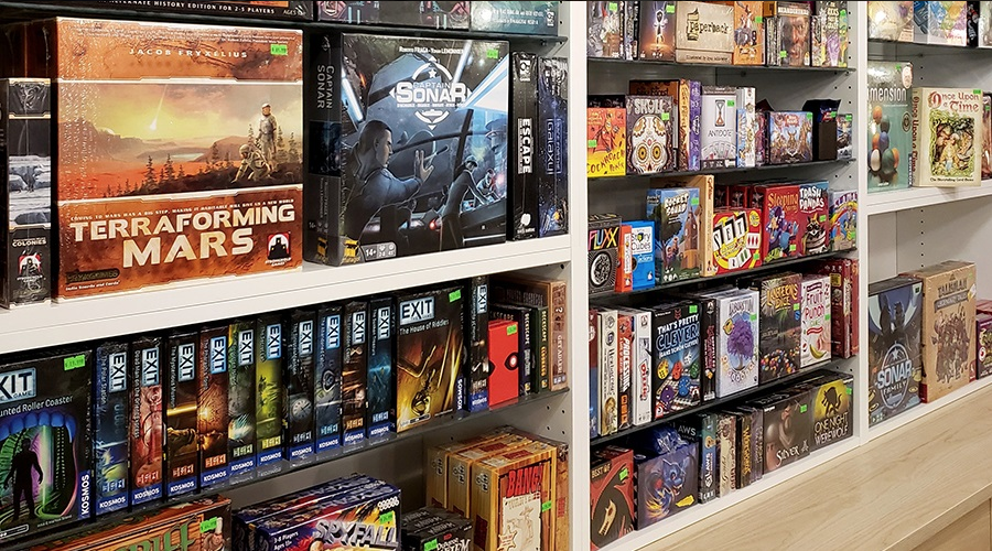 Wall of board games at Raincity Games